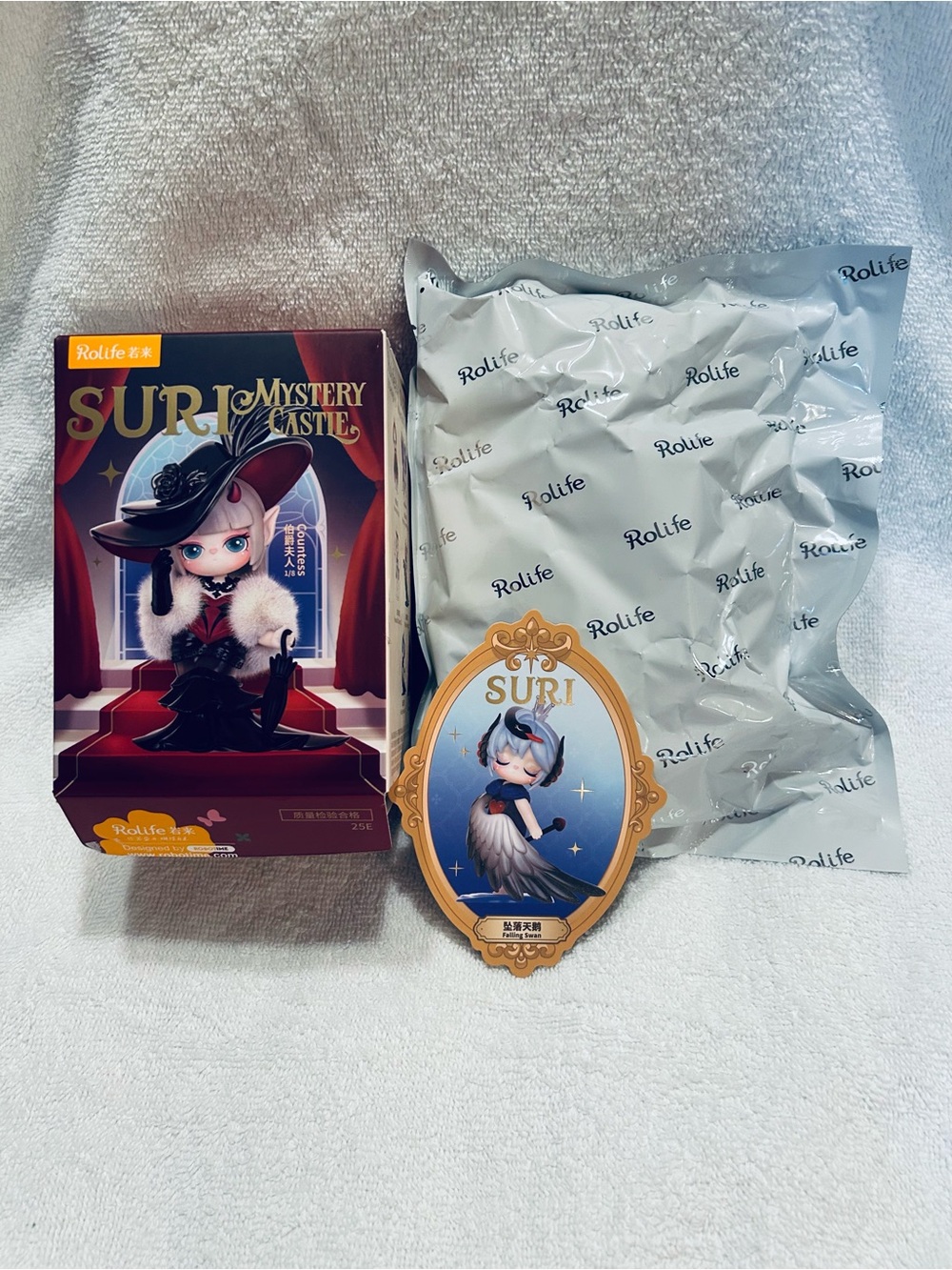 Suri Mystery Castle Figurine- Falling Swan